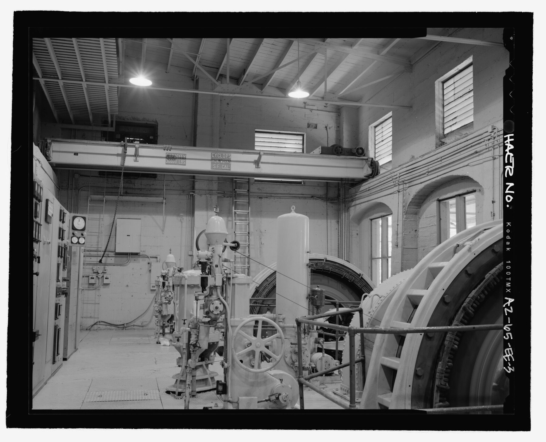 Generators and water wheels inside a hydroelectric powerhouse