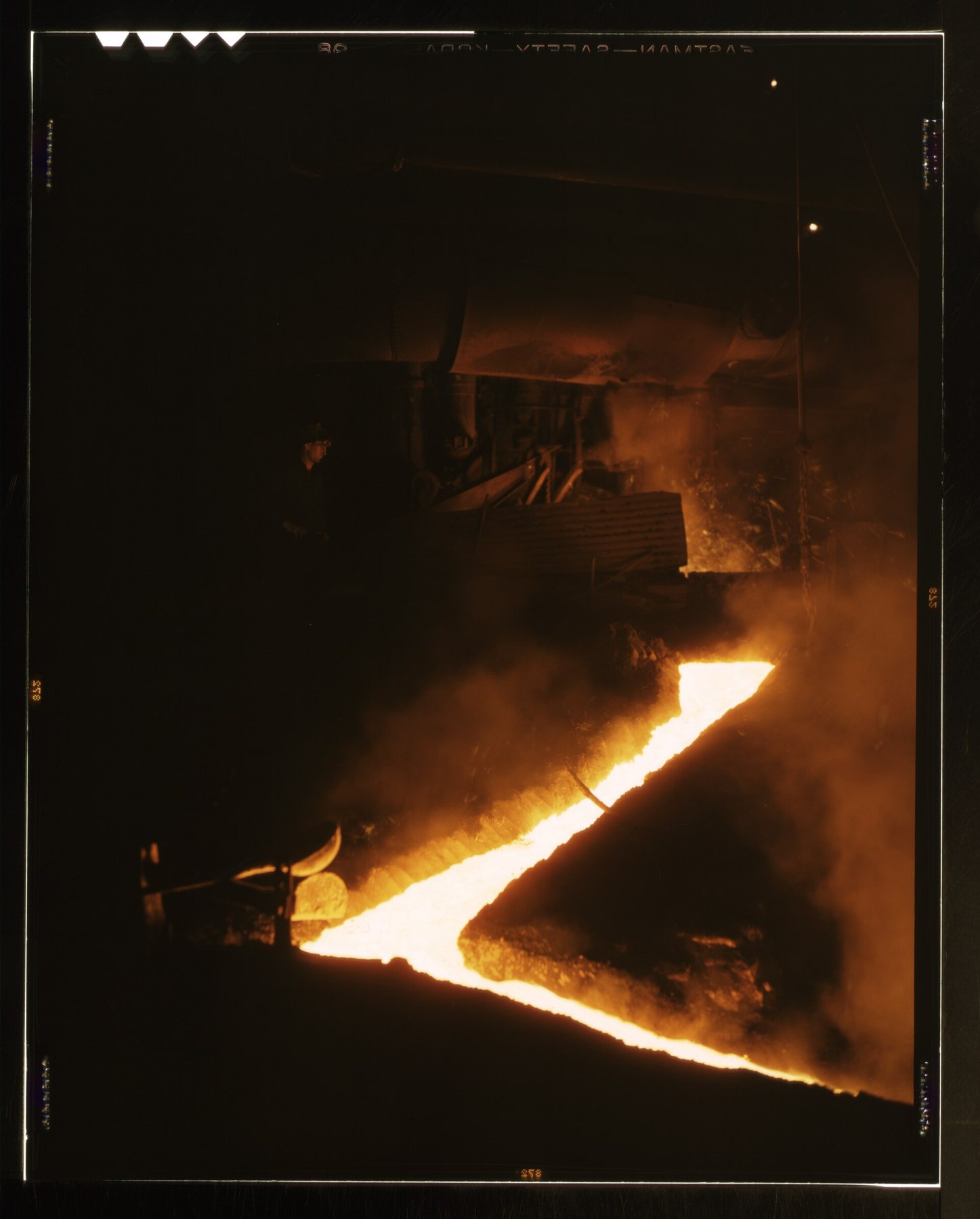 Slag running off from an open hearth furnace at a steel mill